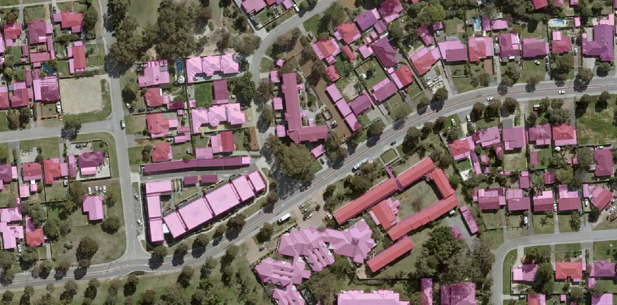 Building footprints and urban change in aerial imagery